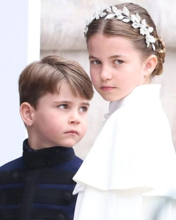 Princess Charlotte with a flower wreath as Princess Catherine holding hands with brother Louis at the coronation