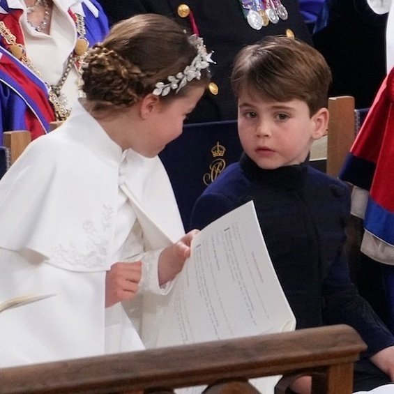 Princess Charlotte with a flower wreath as Princess Catherine holding hands with brother Louis at the coronation