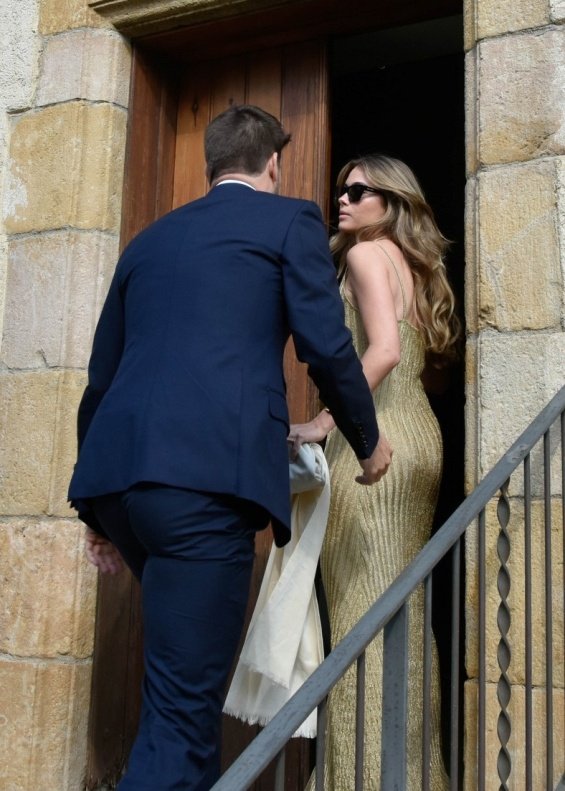 Gerard Pique with girlfriend Clara Chia at his brother's wedding in Spain