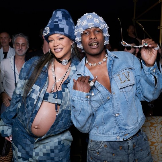 Rihanna bares her pregnant belly in denim styling at the Louis Vuitton men's show