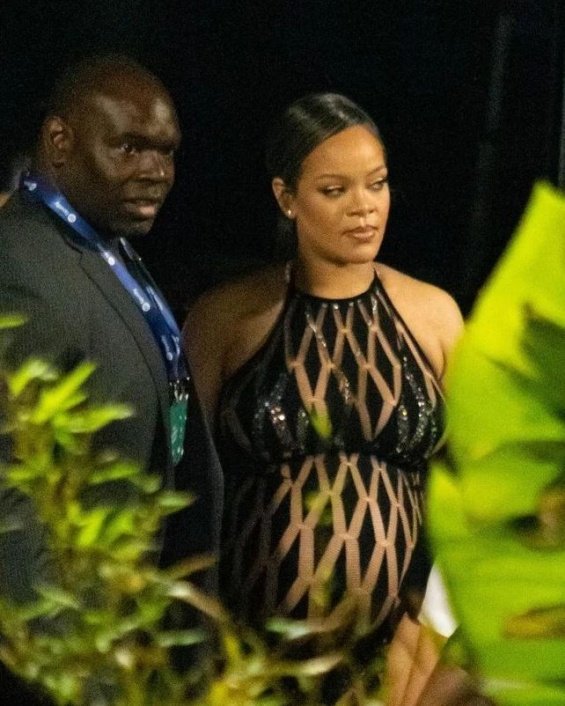 Rihanna in a see-through jumpsuit with ASAP Rocky at a party in Nice