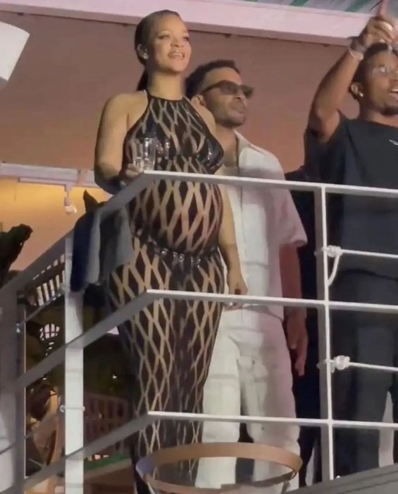 Rihanna in a see-through jumpsuit with ASAP Rocky at a party in Nice