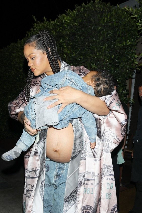 Pregnant Rihanna Photographed With Her Sleeping Son In Her Arms Days Before Giving Birth