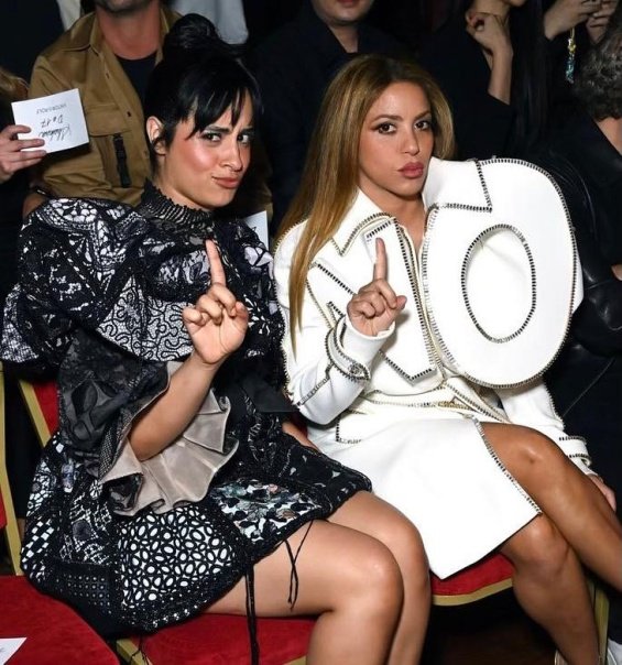 Shakira In A White Coat With The Inscription 'NO' At A Fashion Show In Paris