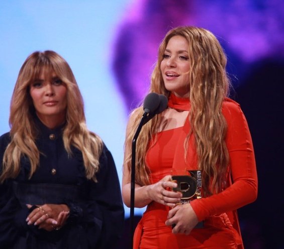 Shakira Shines in Red Mini Dress with Her Sons at Award-Winning Event