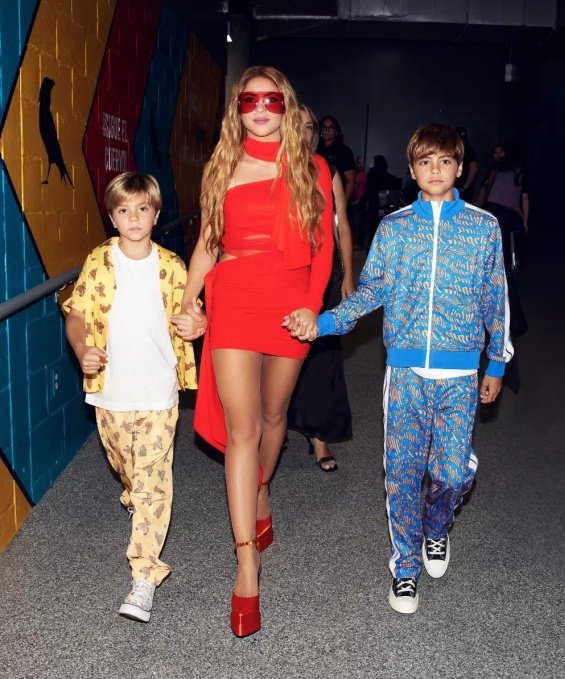 Shakira Shines in Red Mini Dress with Her Sons at Award-Winning Event