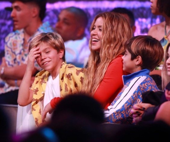 Shakira Shines in Red Mini Dress with Her Sons at Award-Winning Event