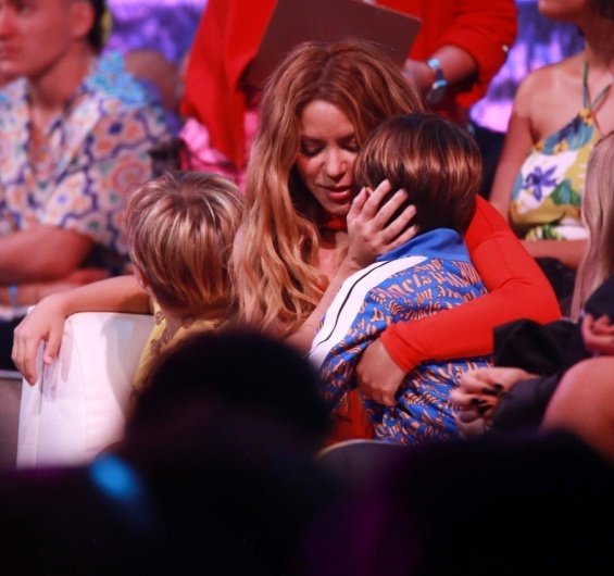 Shakira Shines in Red Mini Dress with Her Sons at Award-Winning Event