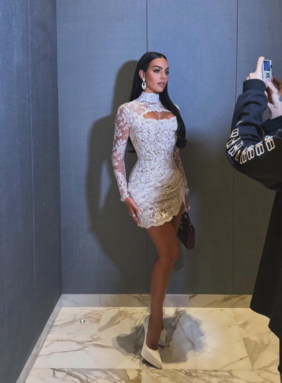 Georgina Rodriguez In A White Lace Mini Dress Alongside Cristiano Ronaldo At An Event In Dubai