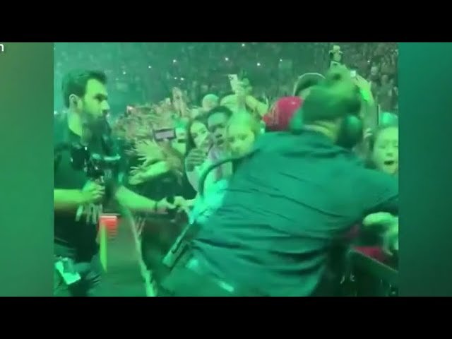 Billie Eilish Aggressively Pulled by Fan in Barricade During Miami Concert