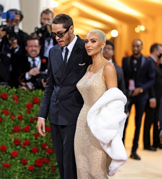 Kim Kardashian in a $5 million dress worn by Marilyn Monroe with Pete ...